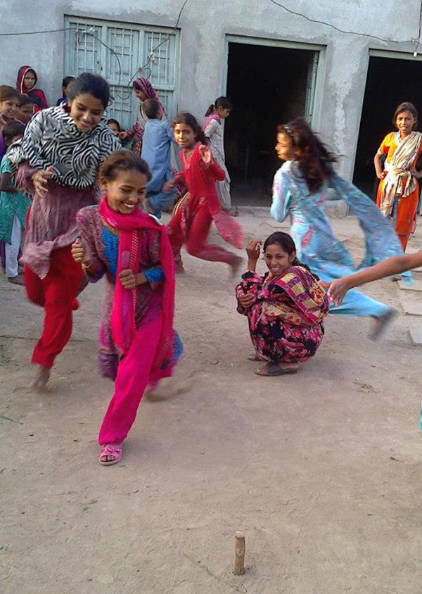 relief_001 people running around enjoying activities outdoors