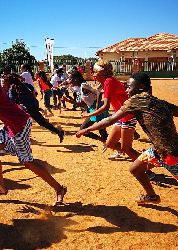 children playing sports outdoors