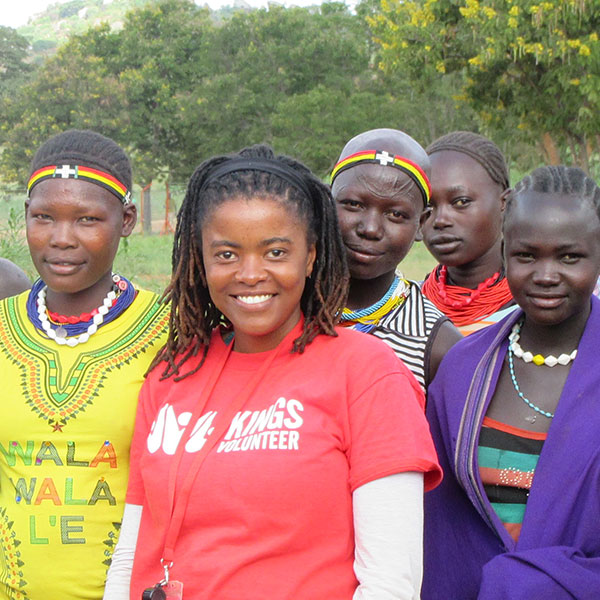 relief_008 kings volunteer with residents smiling