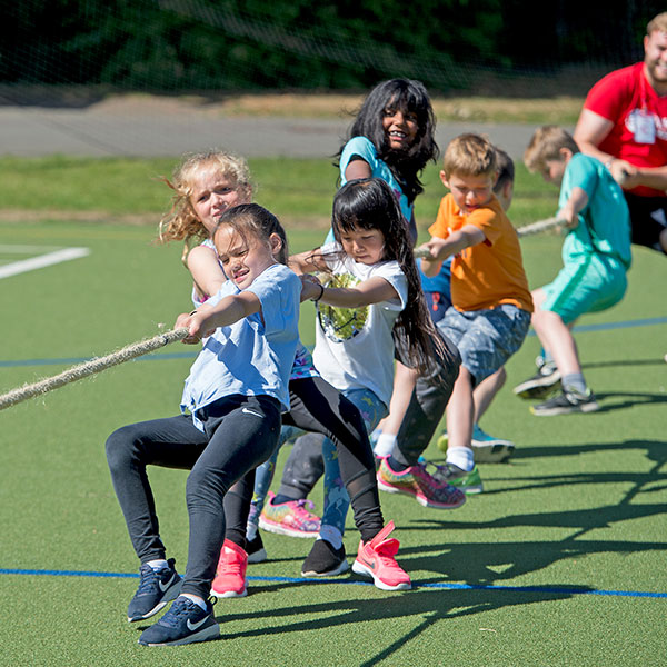 children playing a game of tug of war