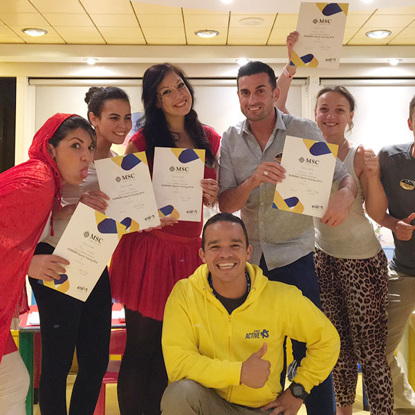 a group of staff with their certificates